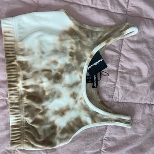 soft, almost fur like, cropped tan tank top with an elastic bottom